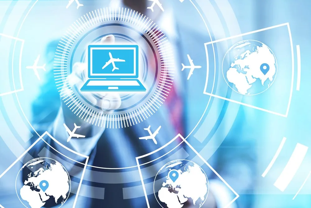 A laptop with a flight icon surrounded by planes and globes, showing connected travel technology